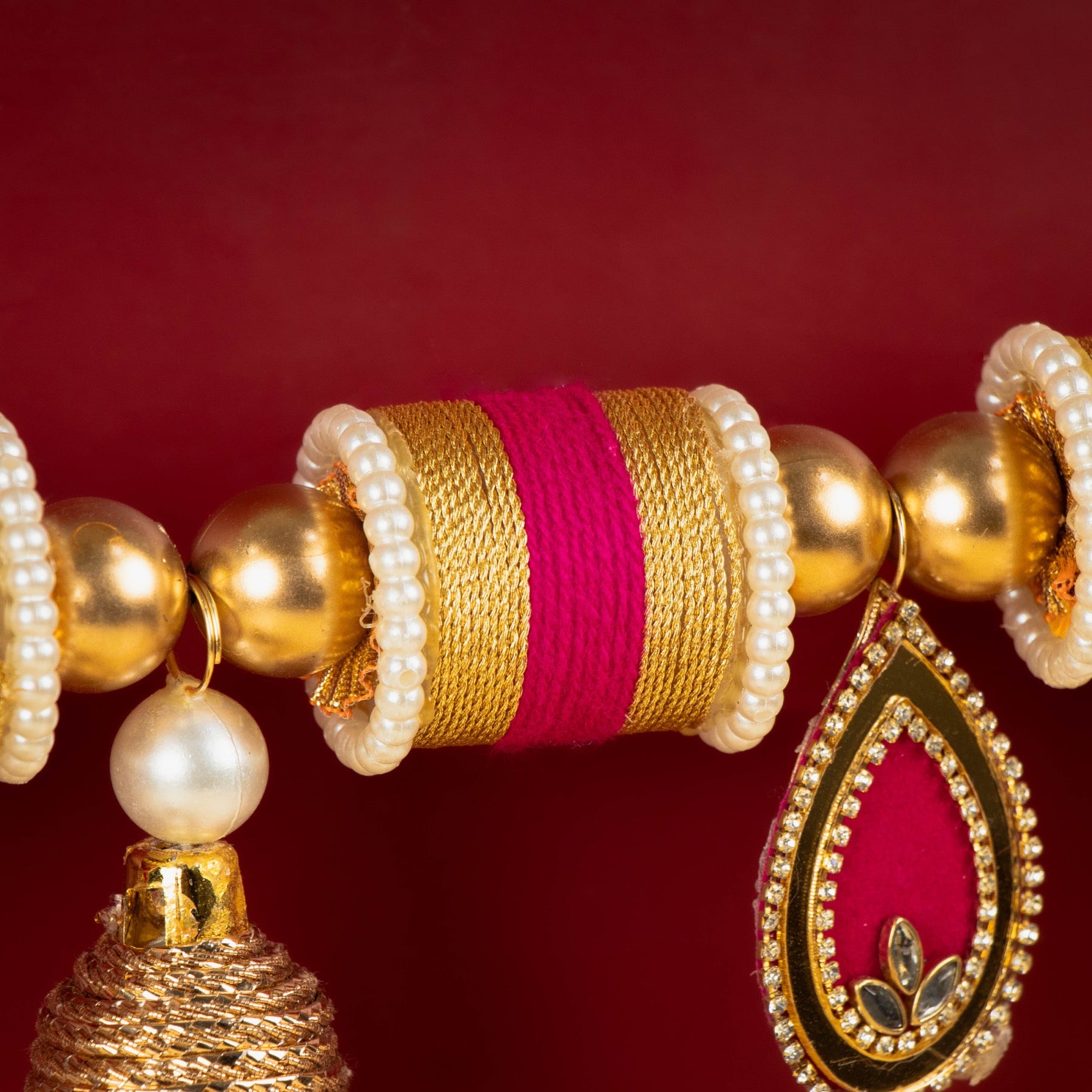 Handcrafted Golden Bell & Pink Floral Toran with Beaded Accents